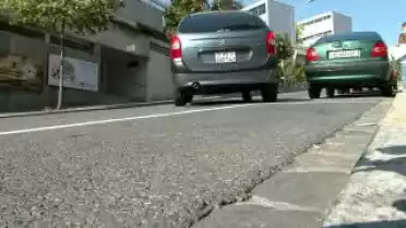Que dois-je voter : parking à Orbe.