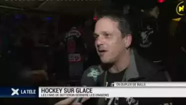 Hockey: les fans de Gottéron derrière les Dragons
