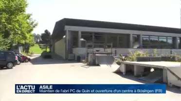Asile: Guin restera ouvert et un centre sera créé à Bösingen