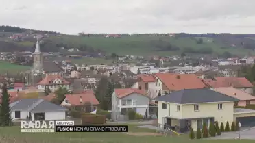 La fusion du Grand Fribourg en question