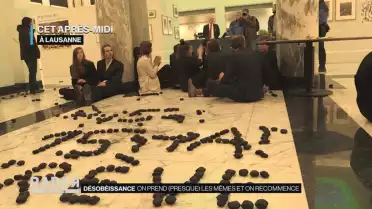 Action des activistes climatiques à UBS Lausanne