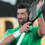 Djokovic domine au 1er tour de l'Open d'Australie, égalise Federer