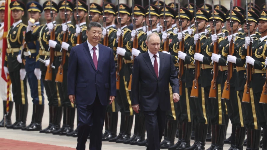 Xi reçoit Poutine en sommet à Pékin peu après la visite de Trump