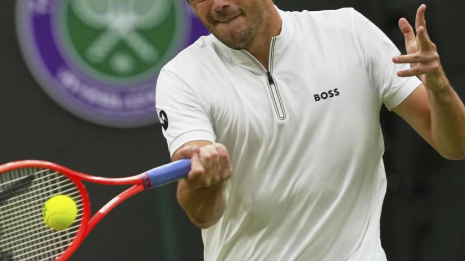 Wimbledon : Fritz en quart de finale après l'abandon de Thompson Wimbledon : Fritz en quart de finale après l'abandon de Thompson